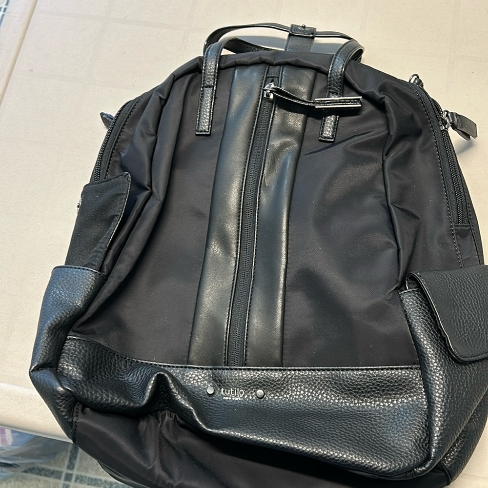 Black travel backpack (faux leather)